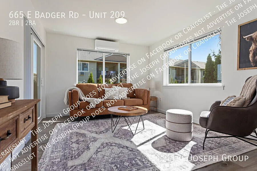 Building Photo - 665 E Badger Rd #209
