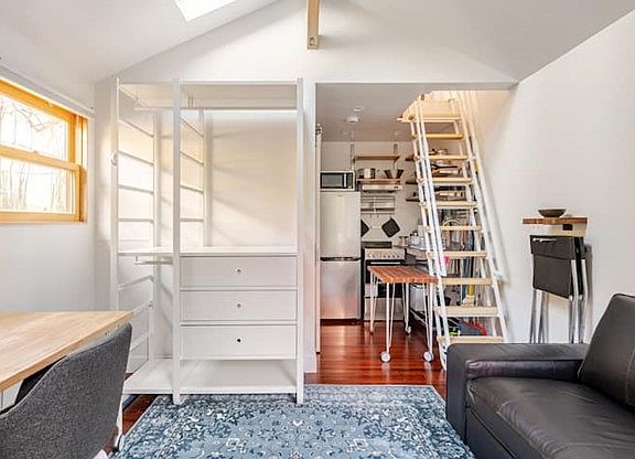 kitchen and stairs leading to the mezzanine
