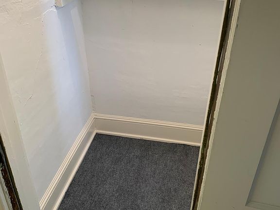 Down stairs coat closet