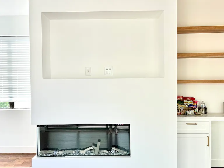 4th level bonus living/media room. Built in digital fireplace and pre-fabricated media center. Additional den/nook