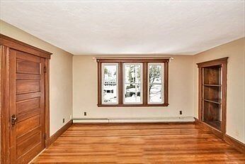 Bedroom, one of two large closets to left