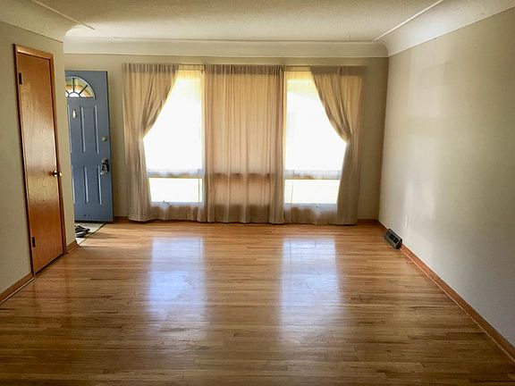 Hardwood floors in living room and bedrooms