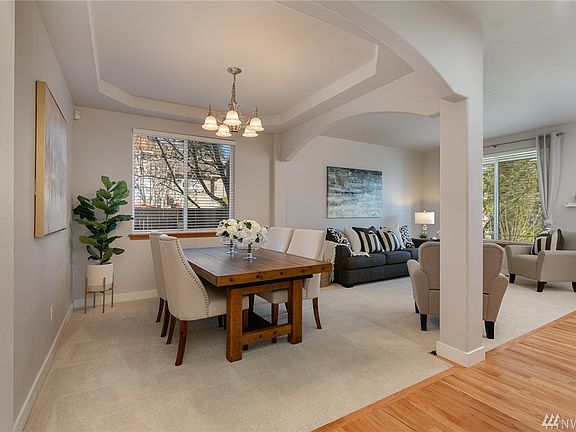 Formal living and dining rooms defined by dramatic archways yet are open to one another thus visually      expanding the space! 