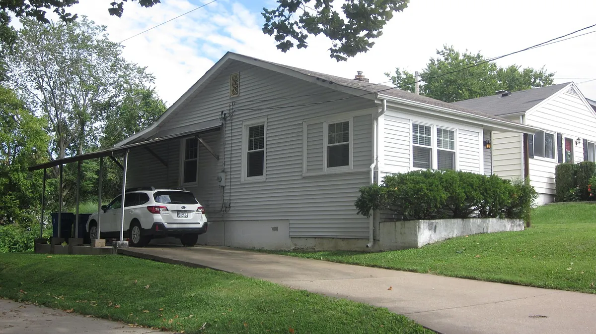 Side with carport - 7563 Folk Ave