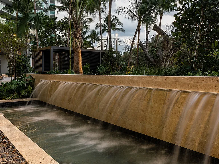 Soothing water installations fill the grounds of your community.
