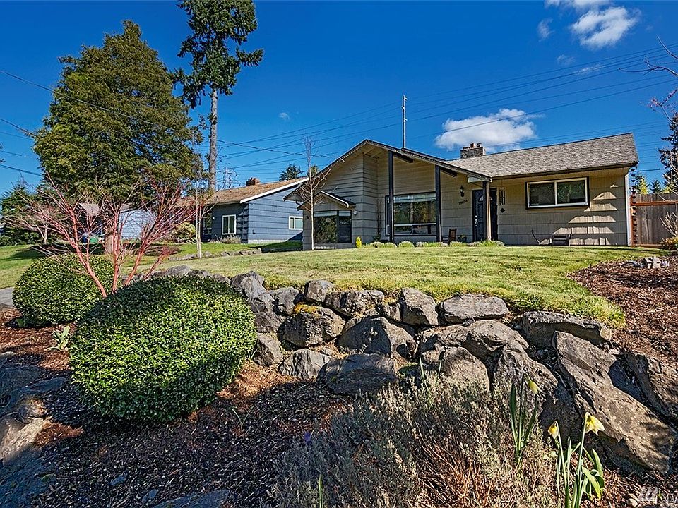 Delightfully maintained landscaping creates terrific curb appeal. Spring flowers are poised to issue forth. Features include ornamental grasses and lavender near the front porch, one young flowering cherry tree, two young white birch trees, one Japanese maple, one young maple tree and a raised rockery. This is a gardener's delight!