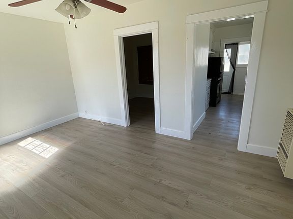 Livingroom toward bedroom and kitchen