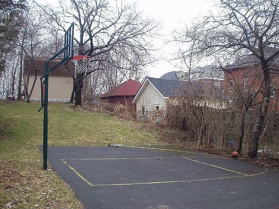 Backyard w/basketball court