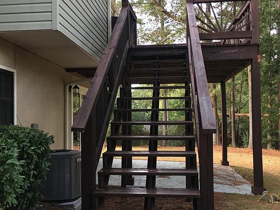 Renovated deck area and fully fenced backyard.