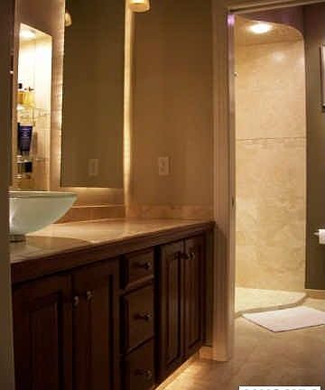 Travertine mrbl walk-in Roman-style shr; grdn tub; vessel sink elegant  blt-in