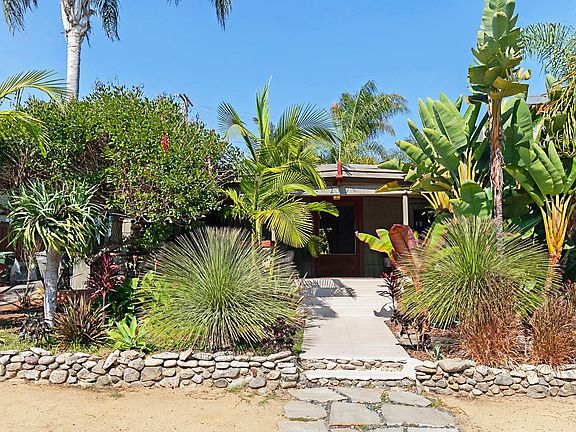 Front with beautiful landscaping