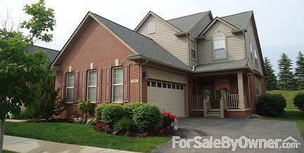 Front of Condo
						:
						Side two car garage, covered porch