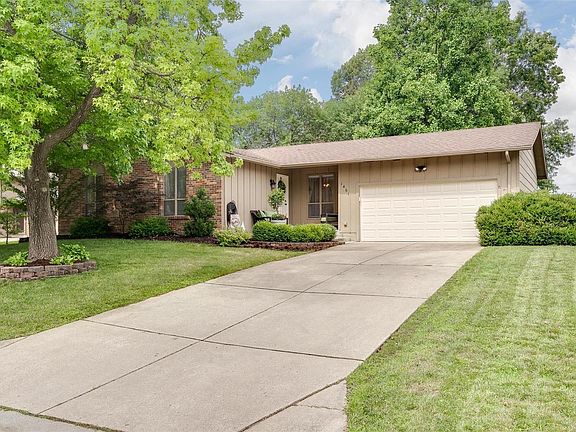 Nice long concrete driveway and 2 car oversized garage with workshop/hobby area....