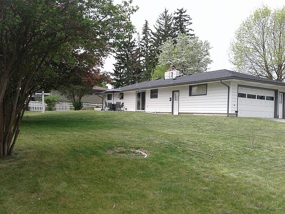 Garage entry and back yard