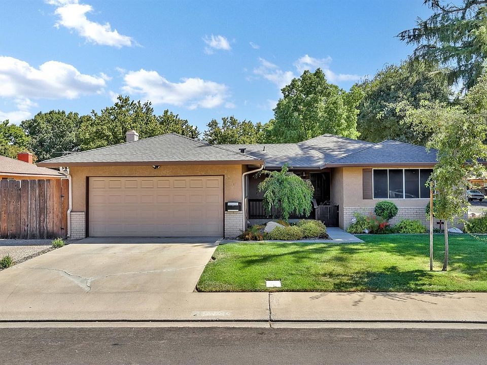 LOVELY 1-story home on a corner lot with RV ACCESS!