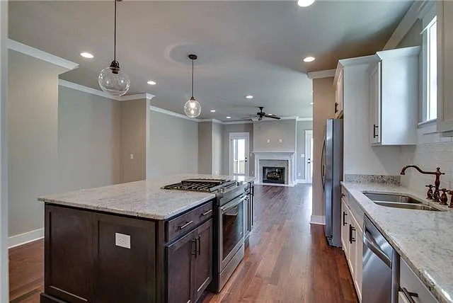 Entertainers dream kitchen. Jenn Air range in the center of the island so you can cook meals while conversing with guests.