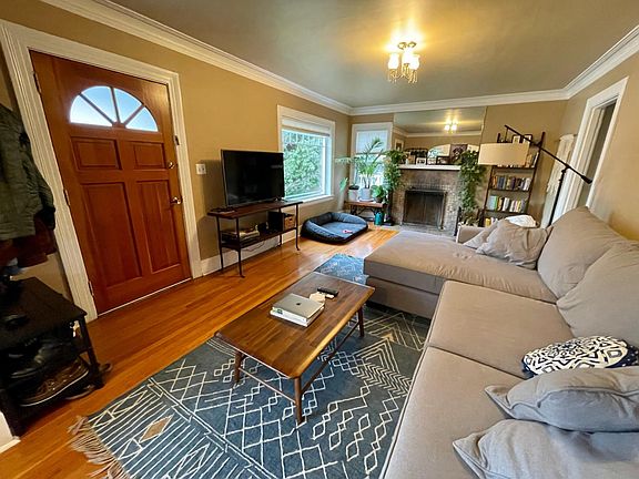 Living room with large south facing window with good natural light