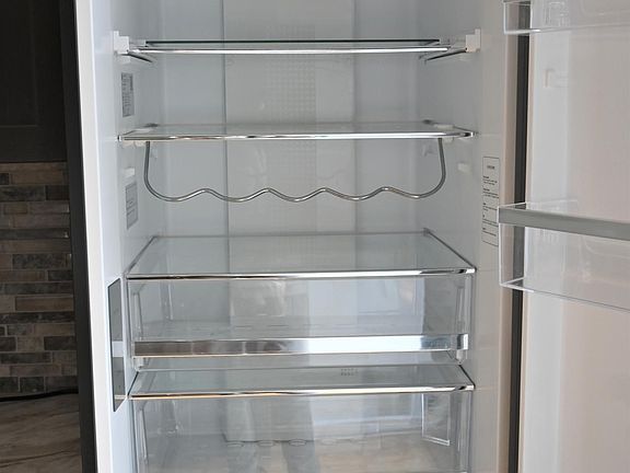 Kitchen refrigerator with wine rack option.