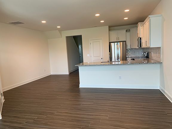 Living area looking into the kitchen