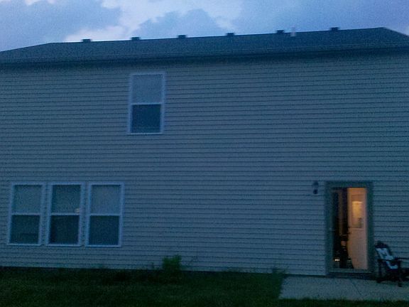 The back of the house with the new door.