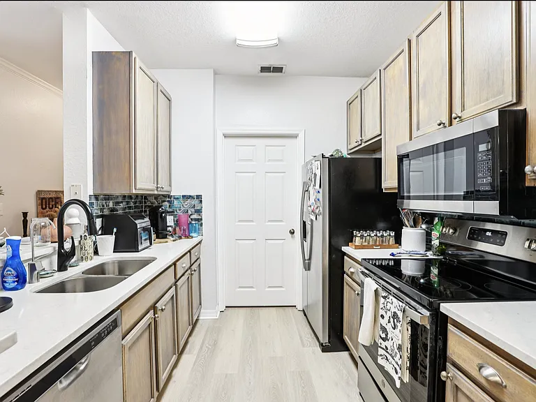 10125 Courtney Palms Blvd #201 — Photo 13