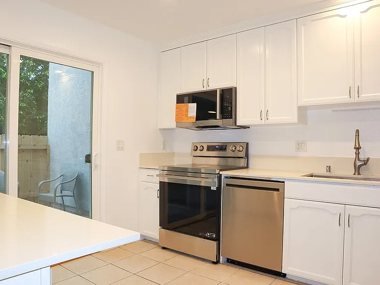 Kitchen with new appliances.