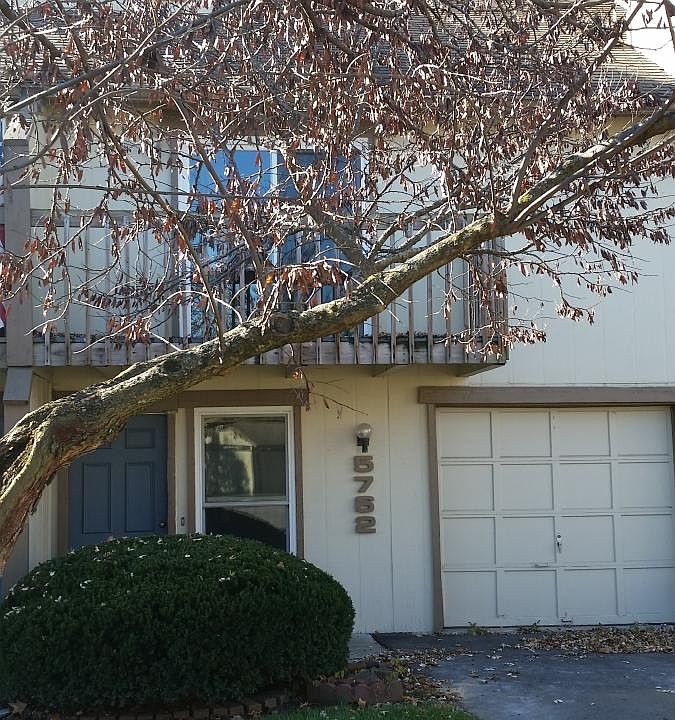 Front entrance and attached garage