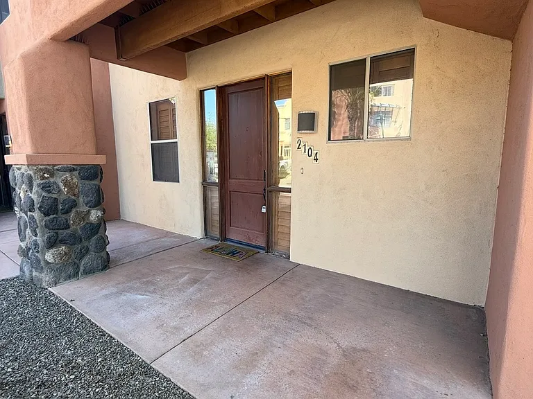 Front door - West Facing with front entryway overhang.