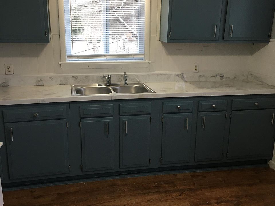 Cute kitchen with plenty of cabinet space.