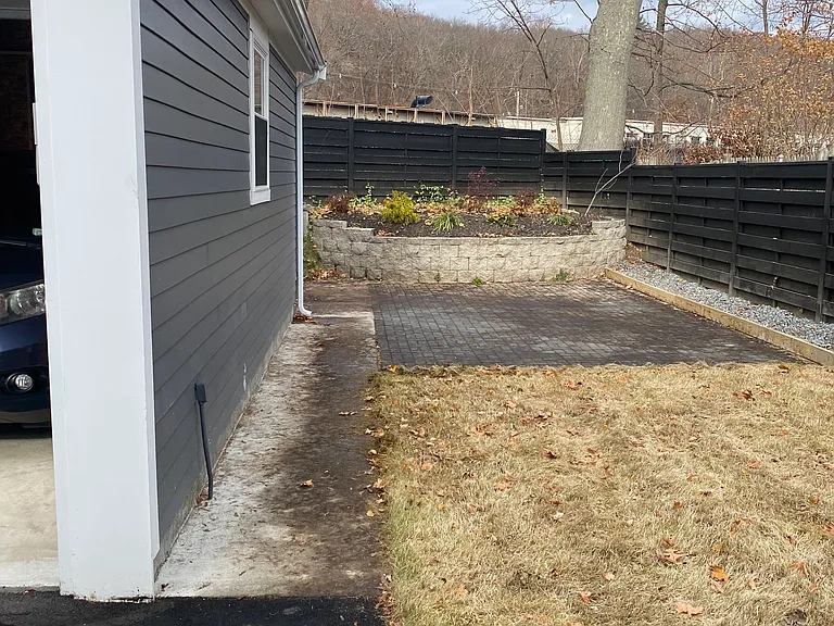 The backyard is a great place for children's activities, sports, and fun time.