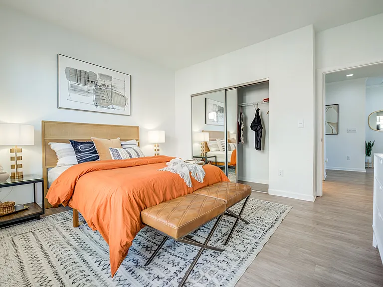 Spacious Bedroom with Hardwood-Style Flooring