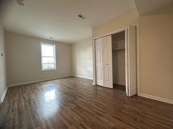 main room with window and closet