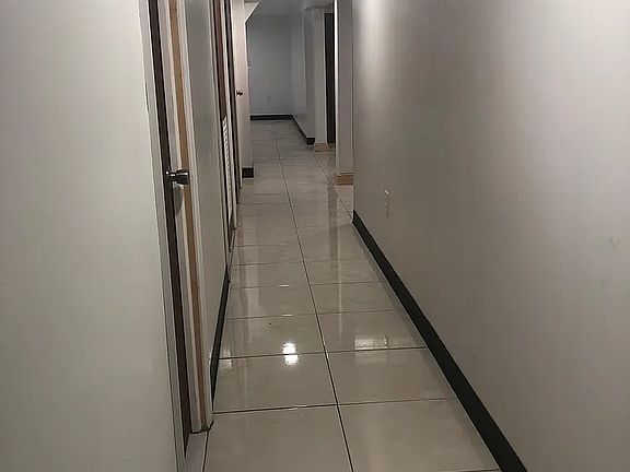 Hallway to bathroom