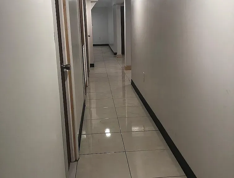 Hallway to bathroom