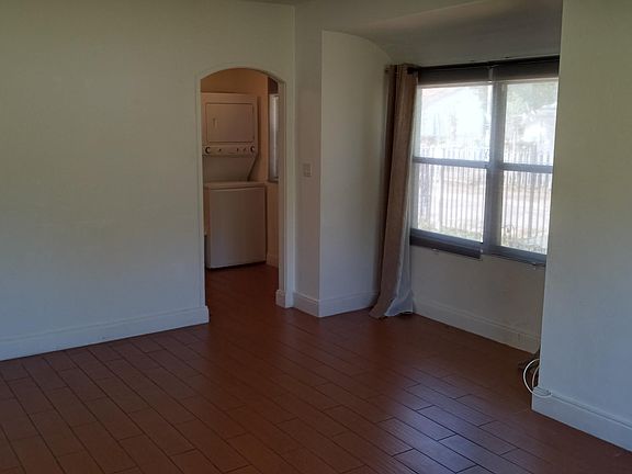 Living room looking into kitchen