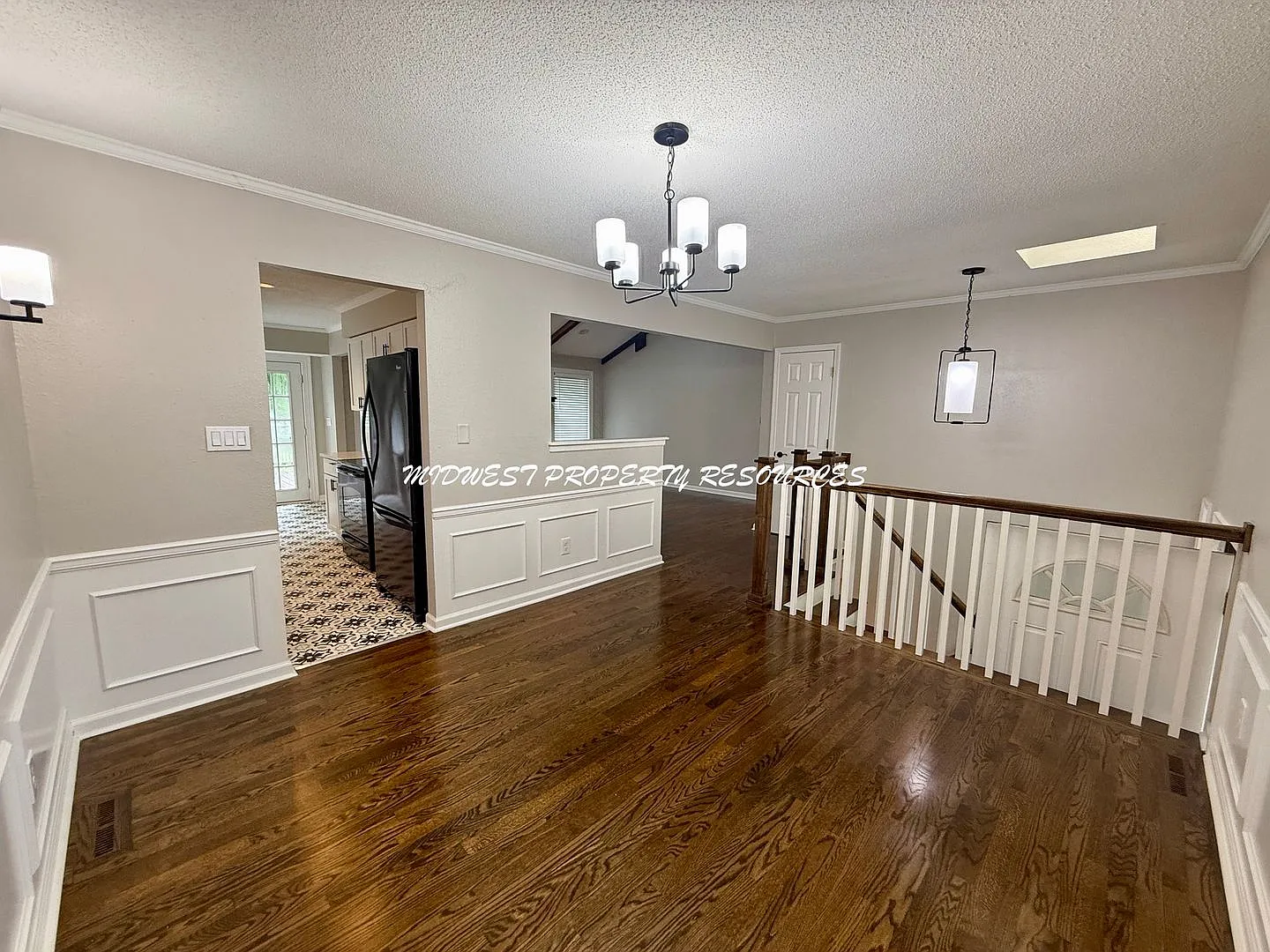 Newly Remodeled 3 Bed, 2.5 Bath Home with Vaulted Ceilings, Finished Basement & Fenced Yard! — Photo 4