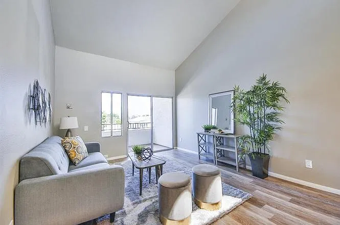 Older photo - lots of light in the unit and vaulted ceilings. The furniture pictured is different.