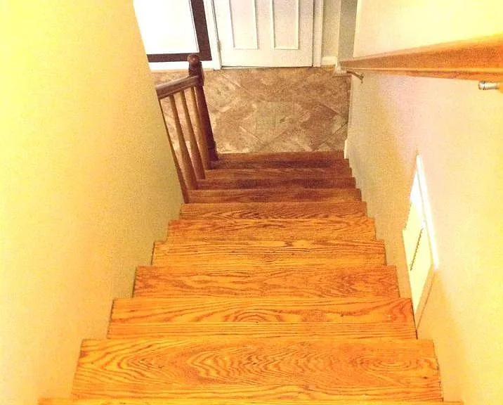 Stairs to Lower level (a door with a lock separates the two levels)