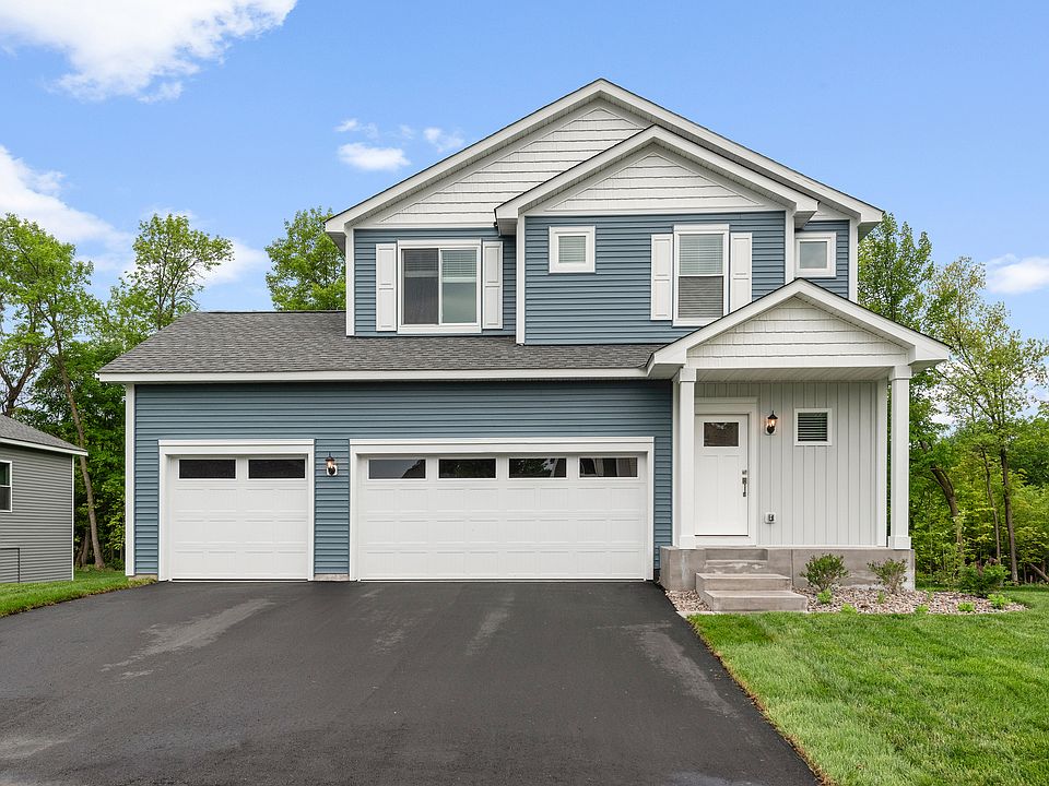 The Granite is a beautiful two story home with siding.