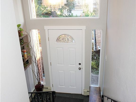 Vaulted entry w/updated light fixture.