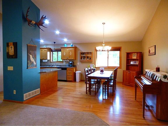 HEART OF THE HOME Dining along kitchen in vaulted Greatroom!