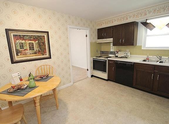 Warm and welcoming eat in kitchen.