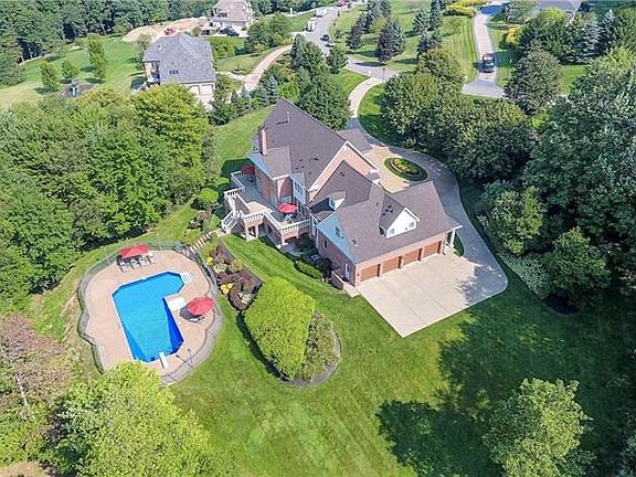 Home comes with 3 newer furnaces & 2 newer AC's, heated 4 car garage, sprinkler system, house sound system, security system, gut