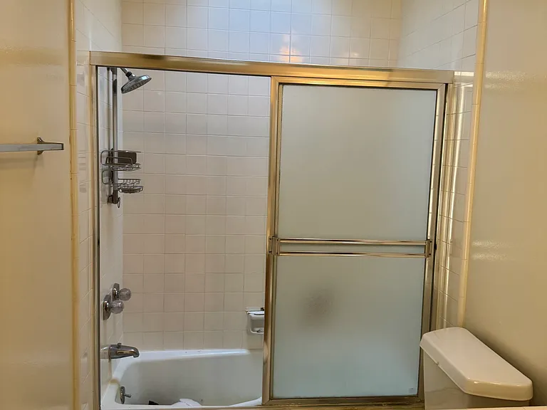 Bathroom with shower tub combo
