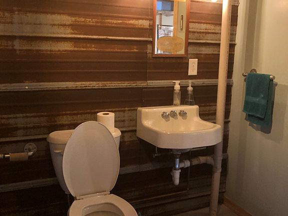 Rustic barn tin in basement!