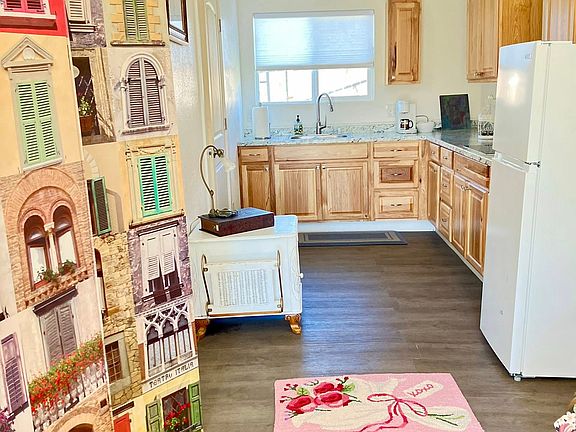 Updated Kitchen/Storage/Fridge/Privacy Screen w/bed behind!