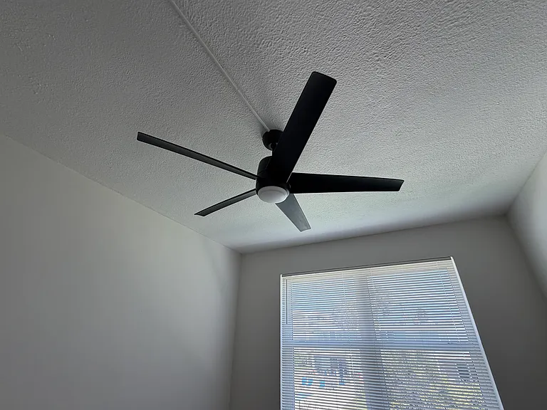 Master Suite, elevated ceiling and fan.