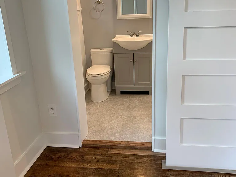 specialty barn door into bathroom