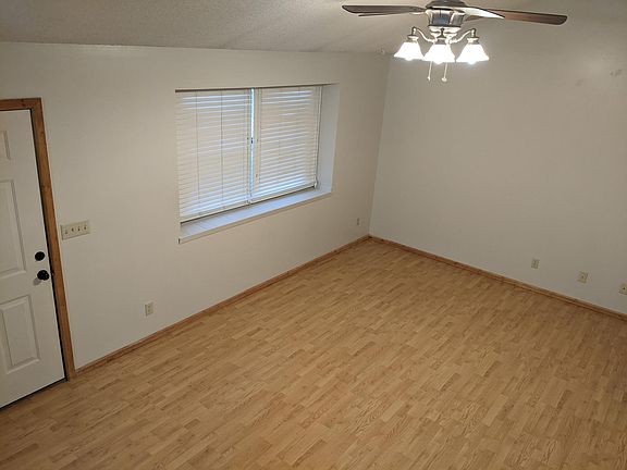 Main living room with tall 2 story ceiling!
