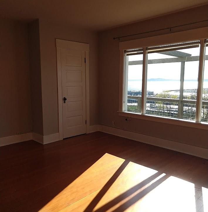 Living room gets evening light and from this side of the room views of west seattle, bainbridge island, elliot bay marina